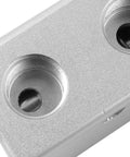 Close-up of a silver metal component with threaded holes for Green Momentary Mushroom Push Button 3 Way Pneumatic Valve