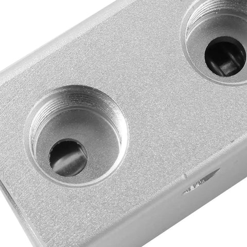 Close-up of a silver metal component with threaded holes for Green Momentary Mushroom Push Button 3 Way Pneumatic Valve