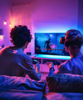 Gamers in a room illuminated by Color Changing LED Strip Light Kit With Three Dope Pre Cut 12 Inch Segments 36 Inches Total Flexible 5050 LED Lights.