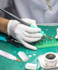 Person using Three Piece No Clean Soldering Pen Rosin Solder Pen For Electronics Tabbing Wiring Liquid Solder For PCB Board Maintenance And Welding Pro Grade Tools 5.6 Inch Length Grab And Go Soldering Kit on PCB board.