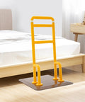 Chair And Couch Stand Assist Bar With Auto Light For Easy Getting In And Out, Heavy Duty Bed Rail, yellow by a bed