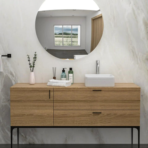 White Ceramic Square Vessel Bathroom Sink on wooden vanity with round mirror in modern bathroom setting.