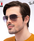 Man wearing RB3449 Pilot Shape Nonpolarized Sunglasses For Men With Gray Gradient Lenses Modern Edge That Keeps It Classic Dope Everyday Wear