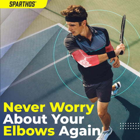 Man playing tennis wearing Large Flamingo Pink elbow compression sleeve for pain relief and support, breathable elastic blend.