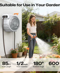 Woman using the Tough As Nails Retractable Garden Hose Reel With Eighty Five Feet One Half Inch Hose, Wall Mount in garden.