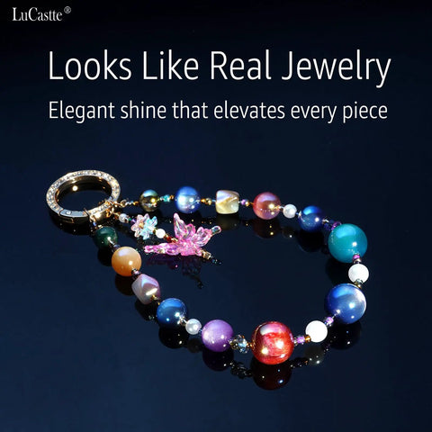 Stellar Beading Designer Kit For Beginners keychain with colorful beads and dragonfly charm, displayed on shiny surface.
