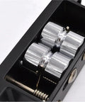 Close-up of Black Touch Type Lock Double Roller Catch For Cabinet Doors, showing silver rollers and durable metal housing.
