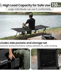 Man sitting on Super Sturdy Height Adjustable Camping Cot With Leg Extenders Holds Up To 330 Pounds by a lake.