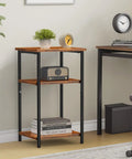 Three Tier End Table With Storage Shelf And Adjustable Feet For Bedroom, Living Room Or Office next to desk, brown finish