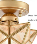 Modern Sleek Brass Moravian Star Ceiling Light Mini Semi Flush Mount With 8 Inch Seeded Glass close-up view