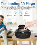 Person using Portable CD Player Bluetooth Boombox With AM FM Radio USB Aux In Headphone Jack MP3 CD Compatible Bass Boost Stereo Sound