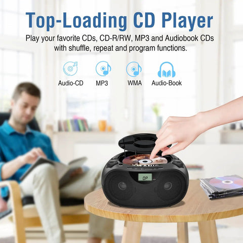 Person using Portable CD Player Bluetooth Boombox With AM FM Radio USB Aux In Headphone Jack MP3 CD Compatible Bass Boost Stereo Sound