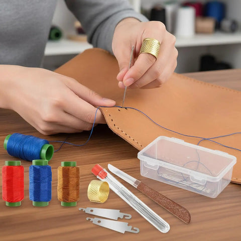 Person using Big Eye Sewing Needles Kit 36 Pcs Stainless Steel With Storage Box for hand sewing leather with blue thread