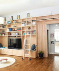 Slick Rolling Barn Door Hardware Kit With Heavy Duty Floor Rollers For Adjustable Tracks Rustic Black Finish No Sweat Install For Home Closets And Storage Rooms with installed track.
