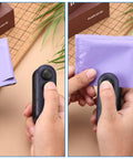 Using 2 In 1 Bag Sealer And Cutter With Magnetic Rechargeable Power to seal a purple plastic bag.