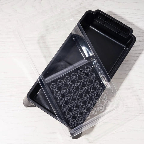 Disposable 4 Inch Paint Tray Liners Set With Plastic Tray And Roller Frame, showing a black tray and clear liner on white surface.