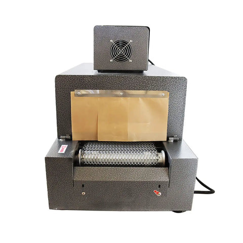 No Nonsense Heavy Duty 220V Heat Shrink Tunnel Machine featuring quartz infrared tubes with front view and mesh roller for wrapping.