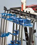 Image of a heavy duty wall mounted pipe clamp rack that keeps clamps in line, built from galvanized steel, holds nine pipe and bar clamps up to 0.30 inches wide.