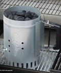 Chimney Style Charcoal Grill Starter With Quick Release Trigger for fast coals lighting, zinc-coated, on grill with charcoal