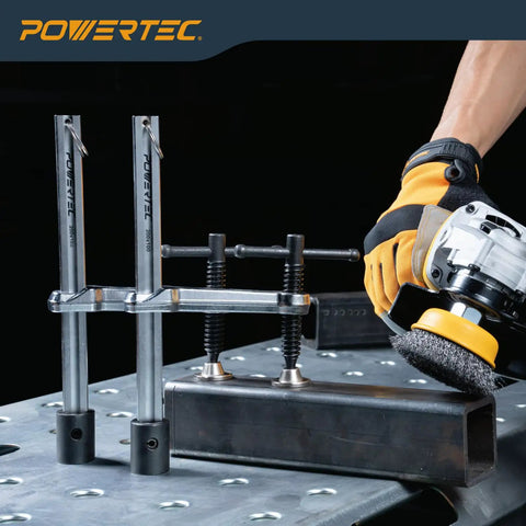 2 Pack T-Handle Welding Clamps Set With 8 Inch Opening And 4 Inch Throat Heavy-Duty Bench Clamps For Five-Eighths Inch Welding Table Holes Delivers Up To 400 Lbs Clamping Force on a metal surface next to a person using a tool.