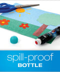 Dab-N-Seal Envelope Moistener with Adhesive Fast Drying Formula 50 mL bottle, spill-proof cap next to craft project.