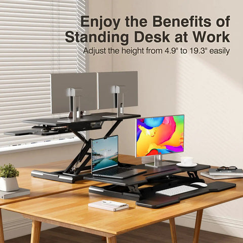 32 Inch Standing Desk Converter With Sit Stand Elevation Height Adjustable Riser Dual Monitor Riser With Keyboard Tray on desk