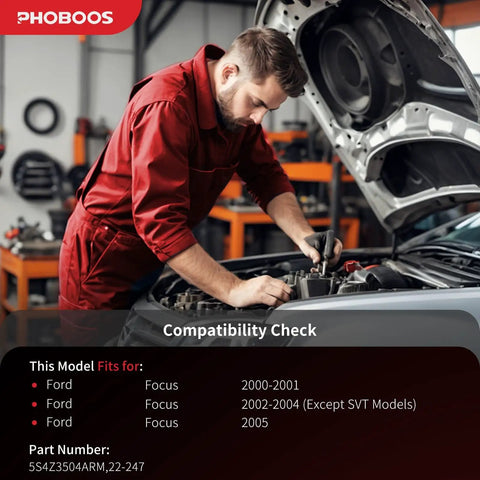 Mechanic working on Ford Focus engine for compatibility check with steering rack and pinion assembly 2000-2005 LHD models.