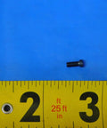 Real Deal MS1182 Indexable Insert Retaining Screw Badass CNC Milling And Turning Hardware Heavy Duty Spare Fastener shown on ruler for size.