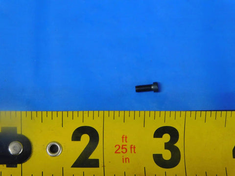 Real Deal MS1182 Indexable Insert Retaining Screw Badass CNC Milling And Turning Hardware Heavy Duty Spare Fastener shown on ruler for size.