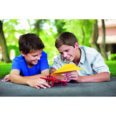 Two kids playing with Electric Paper Airplane Launcher For Kids Ages 8 And Up STEM Building Kit With Motorized Launcher Adjustable Angles
