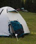 Camping scene with Heavy Duty Tent Stakes and Pegs Kit with Windproof Ropes and Hammer Storage Bag securing a tent
