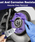 Pro Grade High Temp Brake Caliper Grease For Disc Brakes, 2 Pack 1oz Each applied to wheel hub with silicone lubricant