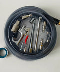 Lightweight Hybrid Air Compressor Hose One Quarter Inch By Thirty Feet With Flex Friendly Bend Restrictors And Thirteen Piece Accessory Kit in packaging.