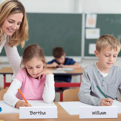Classroom with students using 20 Pack Dry Erase Name Tent Cards With Black Markers No Fuss Wipe Clean Reusable Desk Tags 8.7 X 2.8 X 1.9 Inches