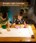 LED Desk Lamp With Clamp For Home Office 77 LEDs 3 Color Modes illuminating children drawing at table