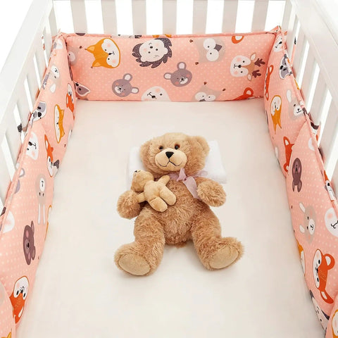 Built Tough Quilted Wall Padding Panels 4 Pack Thick Cushion Guards With Secure Tie Straps in a crib with animal-themed design.
