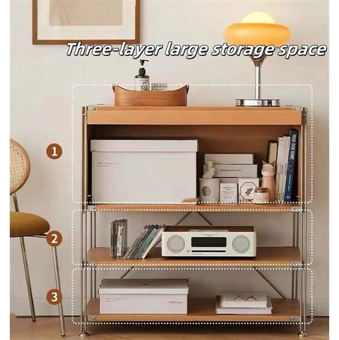 4-Tier Industrial Storage Shelf With Retro Magazine Holder displaying books, lamp, and decor in living room