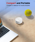 Interconnected Carbon Monoxide Alarm System With No WiFi Needed displayed on desk beside laptop and tennis ball, compact size.