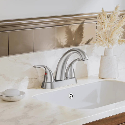Brushed Nickel Centerset 4 Inch Bathroom Faucet For 2 Or 3 Holes Stainless Steel Dual Handle With Copper Pop Up Drain And Water Supply Lines Included Easy Install Durable Modern Vanity Sink Faucet in marble countertop.