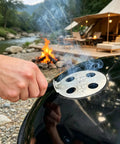 Cool Touch Damper Handle for Smokey Mountain WSM Kettle Grill in use near campfire, thumb knob detail.