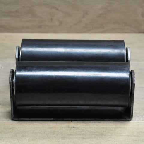 Front view of pair of 6 inch rubber top guide gate rollers for sliding gates, heavy duty wheels in black, weld on for smooth operation.