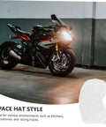 50 Count Elastic Hair Wraps Designed To Keep Your Mane Locked Tight While You Crush Every Shift At The Kitchen Cleanroom Or Facility Breathable Light Fabric Sticks Secure For Zero Fuss Dust Control On The Fly with a motorcycle in the background.