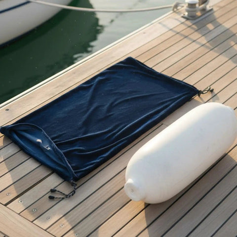 Keep Your Boat Spotless At The Dock With This Inflatable Fender Velvet Hull Protector Marine Impact Absorber Gelcoat Guard Adjustable Drawstring Washable Barrier For Smooth Sailing on a dock.