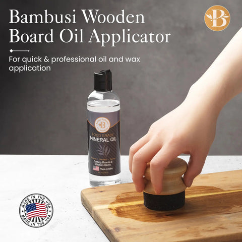 Hand using Oil Applicator Brush For Cutting Boards And Wooden Utensils, Bamboo Wood Brush with mineral oil bottle on table