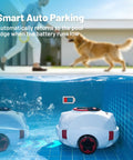 Cordless Robotic Pool Cleaner With 100-Minute Runtime, Dual Suction Ports, in pool, dog and person in background, auto-parking feature.