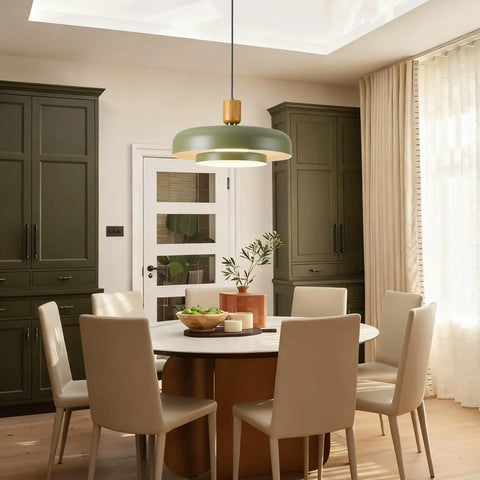 Mid Century Pendant Light 19 Inch Chandelier Featuring Bold Deep Green Shades Paired With Sleek Natural Wood And Polished Brass Accents above dining table in modern kitchen.