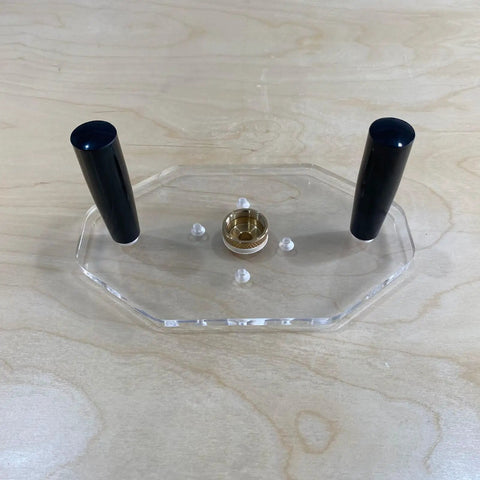 Clear Acrylic Router Base Plate Optimized For Rt0701c And Xtr01z Routers with two black handles and brass center ring.