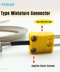 Front view of yellow TCELEC K-type miniature thermocouple connector with stainless steel probe and captive screws