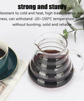 Top Shelf Cold Brew Coffee Maker With Clear Glass Carafe And Sturdy Wood Base Stainless Steel Drip Valve showcasing brewed coffee in a clear glass carafe.