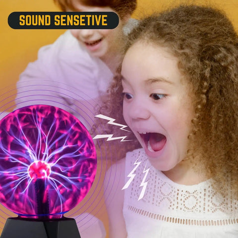 Excited child with 8 Inch Heart Shaped Touch And Sound Sensitive Plasma Lamp Globe For Home And Office Decor A Gift For Curious Minds